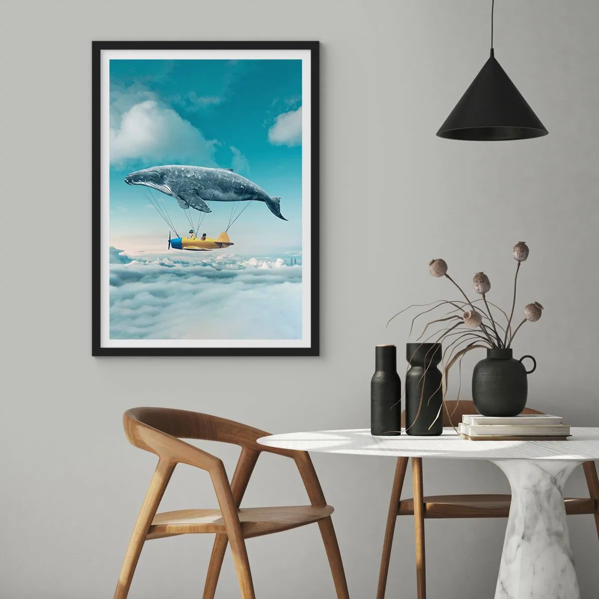 Poster in cornice nera - Una fantastica immagine di una balena che solleva un aereo sopra le nuvole. - 50x70cm - Perché no? - Decorazione murale moderna per soggiorno e camera da letto ARTTOR