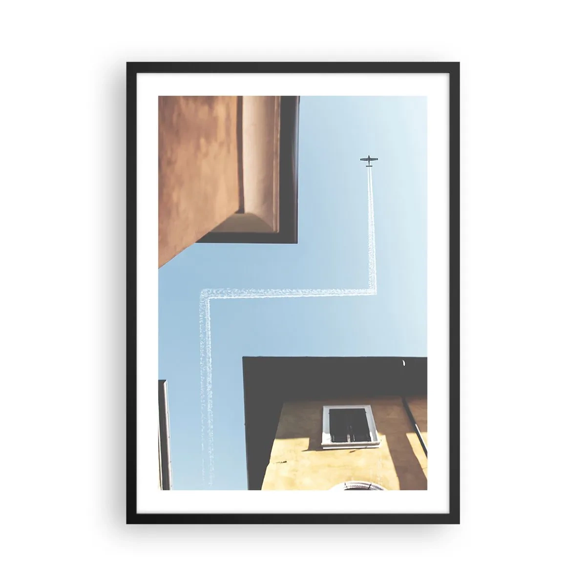 Poster in cornice nera - Prospettiva di edifici con un aereo e un percorso insolito nel cielo - 50x70cm - Sopra il labirinto urbano - Decorazione murale moderna per soggiorno e camera da letto ARTTOR
